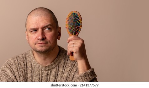 Funny Humorous Portrait Of Bald Man With Comb