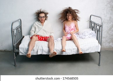 Funny Husband And Wife In The Bed