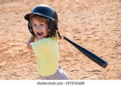 Funny Kid Up To Bat At A Baseball Game. Close Up Child Portrait.