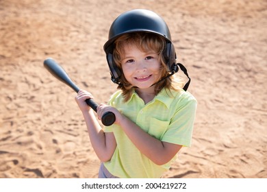 Funny Kid Up To Bat At A Baseball Game. Close Up Child Portrait.