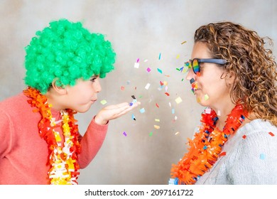 Funny Kid Blowing Confetti To His Mom At Carnival