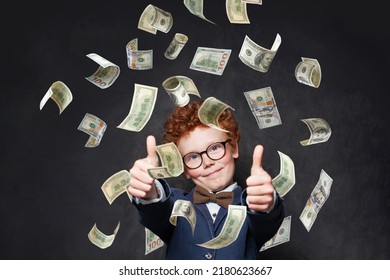 Funny Kid Boy Showing Thumb Up Under Us Dollar Money Rain On Black Background