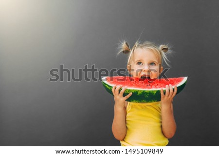 Similar – Glückliches Kind isst Wassermelone