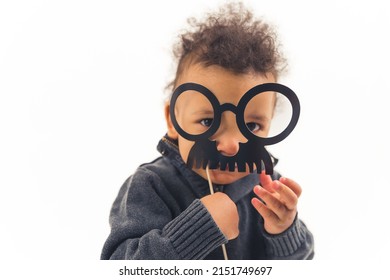 Funny Kid With Fake Mustache, Isolated White Background. High Quality Photo