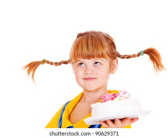 Funny kid holding birthday cake