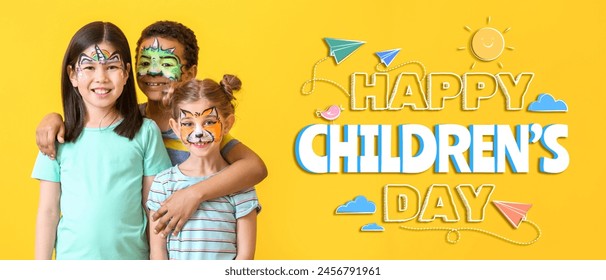 Funny kids with face painting on yellow background. Banner for Children's Day - Powered by Shutterstock