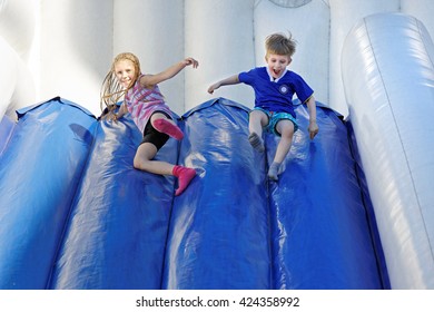 Funny Kids And Off The Inflatable Slides   