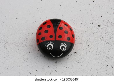 Funny Ladybug As Painted Pebbles