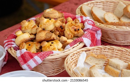 funny litte pig face traditional hungarian bakery pastry pogacsa in a basket  - Shutterstock ID 2133086545