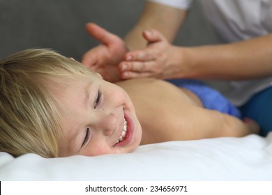 funny little boy with a massage