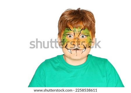 Funny little boy with a painted face