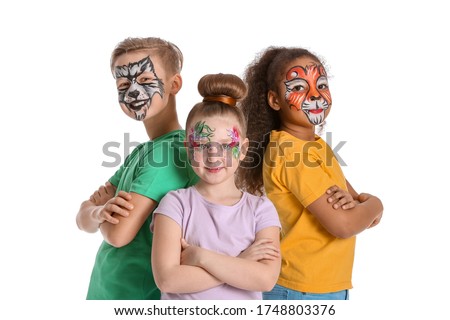 Funny little children with face painting on white background