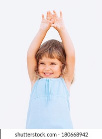 Funny Little Girl With Arms Up