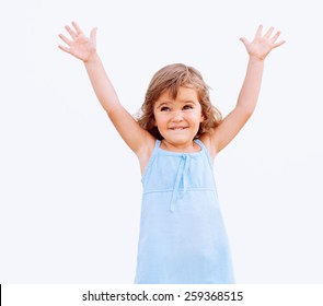 Funny Little Girl With Arms Up