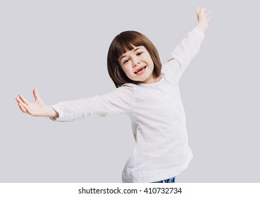 Funny Little Girl With Arms Up