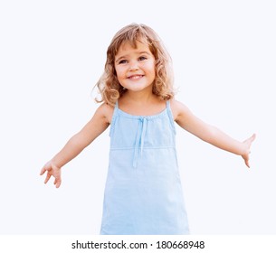 Funny Little Girl With Arms Outstretched