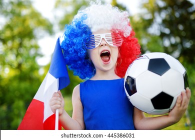 Funny Little Girl Supporting And Cheering Her National Football Team During Soccer Championship