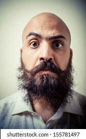 Funny Long Beard And Mustache Man With White Shirt On Gray Background