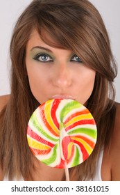Funny looking girl with lollipop
