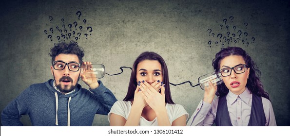 Funny looking man and woman having troubled communication trying to read someone's mind - Shutterstock ID 1306101412