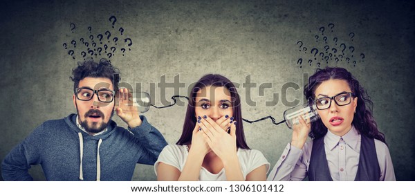 Funny looking man and woman having\
troubled communication trying to read someone\'s\
mind