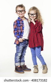 Funny Lovely Children.  Fashionable Little Boy And Girl In Glasses, Jeans, White T-shirts And Plaid Shirts. Stylish Kids In Casual Clothes In Shocked. Fashion Children