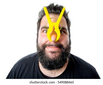 Funny Man With A Clothespin On His Nose