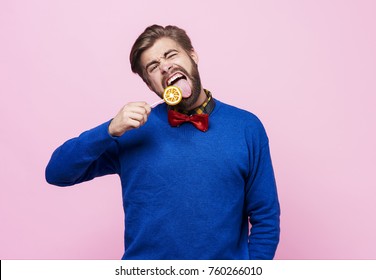 Funny Man Licking A Lollipop