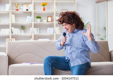 Funny Man Singing Songs In Karaoke At Home