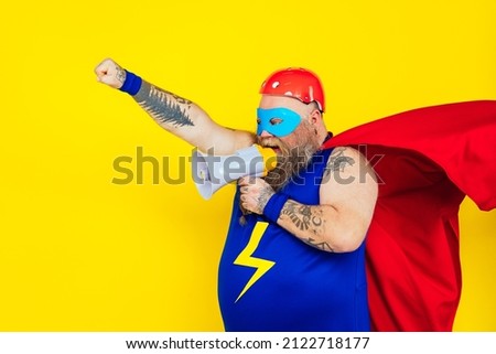 Funny man wearing a superhero costume