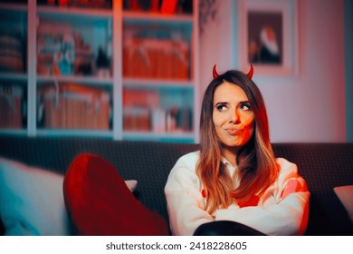 
					Funny Mean Girl Wearing Devil Horns Making Malicious Plans. Scheming toxic person being on her own with no one to love 
					
