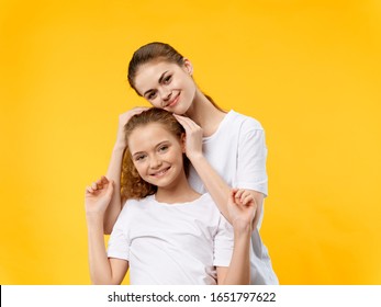 Funny Mom And Daughter In White T-shirts Hugging T-shirts Smile Joy