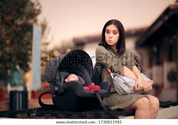 Funny Mom on Vacation\
Watching Over Asleep Baby. Loving Traveling  mother looking at\
napping tired newborn \
