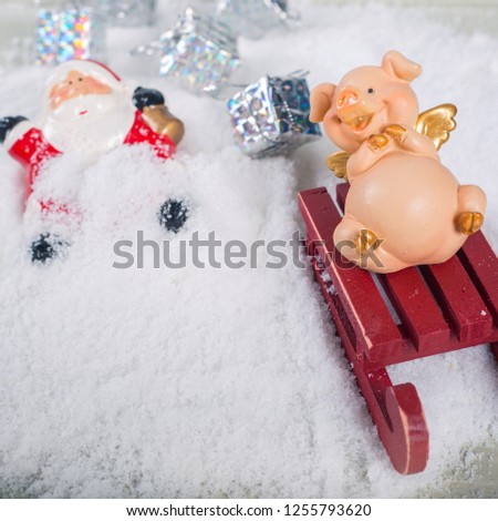 Funny naughty pig laughing at santa claus accident who fall from sleigh and lost gifts