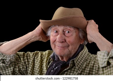 Funny Old Man Wearing A Green Checked Shirt And A Tan Felt Hat