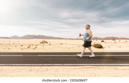 Funny Overweight Man Jogging On The Road With Copy Space