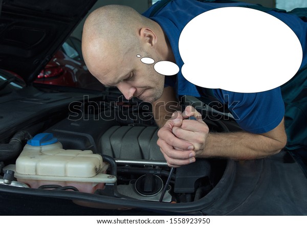 Funny picture with bubble idea car service\
technician who repair the car engine\
motor.