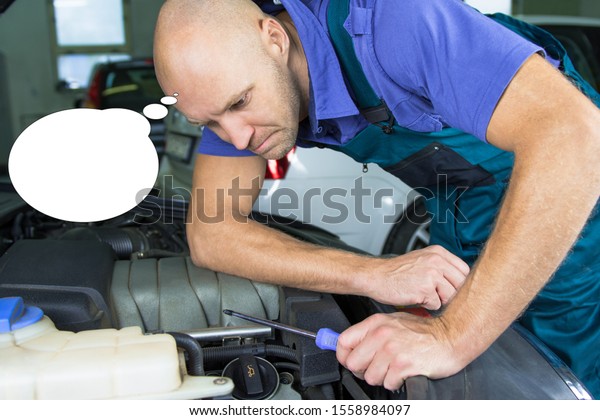 Funny picture with bubble idea car service\
technician who repair the car engine\
motor.