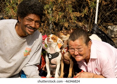 Funny Picture Of Wacky People And Two Dogs