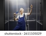 Funny plumber singing in the elevator and using his water pump pliers as a microphone