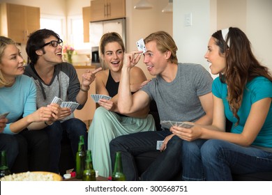 Funny Poker Player Game Night Group Of Friends At Home Laughing