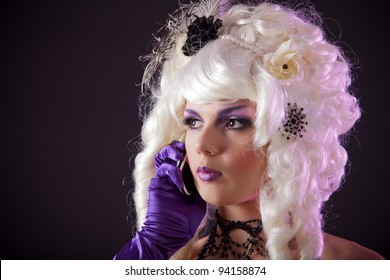 Funny Portrait Of Burlesque Woman In White Colonial Wig Speaking On Phone