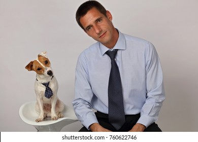 Funny Portrait Of Elegant Man And His Dog. Dog And Owner Matching Clothes