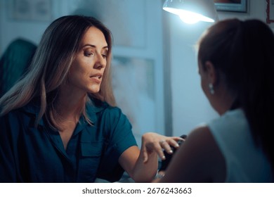 
Funny Puzzled Customer Getting her Manicure in a Salon. Client regretting getting her nails done by a questionable professional 
