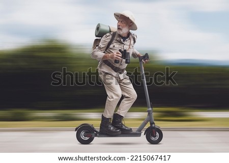 Funny scared explorer being chased by a monster, he is riding an electric scooter and running away