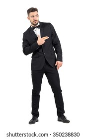 Funny Secret Agent With Finger Gun Hand Gesture Looking Away. Full Body Length Portrait Isolated Over White Studio Background.