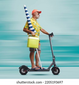 Funny Senior Tourist Holding A Beach Umbrella And Riding A Fast Electric Scooter