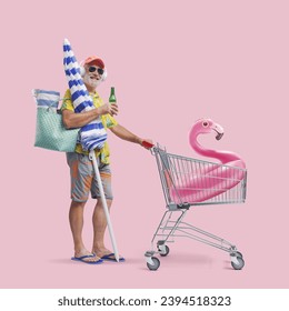 Funny senior tourist pushing a shopping cart and carrying beach accessories - Powered by Shutterstock