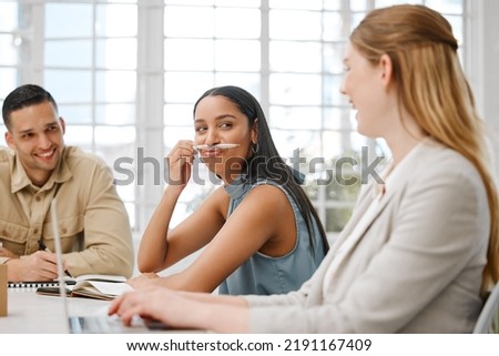 Funny, silly and goofy business woman being playful, joking and having fun with laughing colleagues in an office. Crazy, cheerful and amusing female with humor entertaining happy coworkers at work