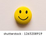 Funny smiley face on white background. Positive mood